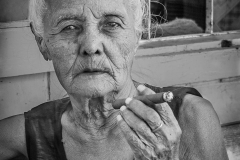 'Enjoying a Smoke': resident at the Buddhist Home for the Aged, Min Gun, Myanmar/Burma (2017)
